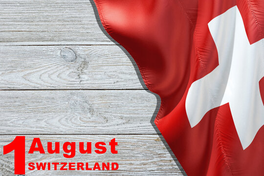 Swiss National Day greeting card. Date August 1 and text in English on a wooden table: 1. August Switzerland. Vector banner with the flag of Switzerland.