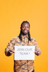 African american hr recruiter holding job offer sign, hiring candidate for business career...