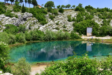Fototapeta na wymiar Cetina River, Spring Blue Eye, source, water, Croatia, tourist attraction, lake, nature, landscape, summer, park, scenic