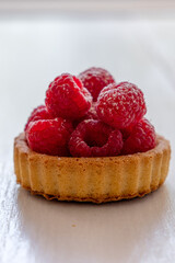 Homemade shortbread raspberry dough. Tartlets with fresh. Close-up