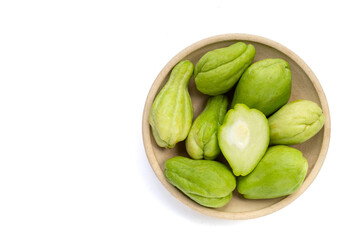 Fresh chayote fruit on white background.