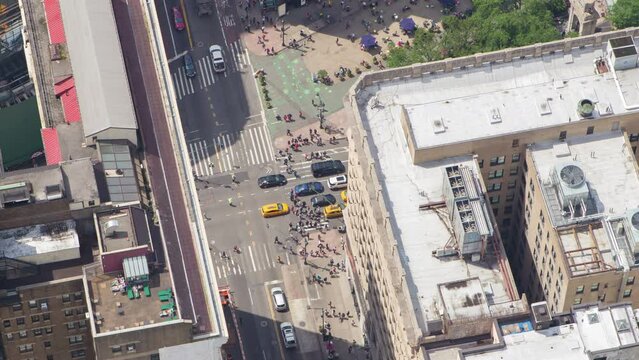 NYC Manhattan busy street traffic rooftop sun bathers