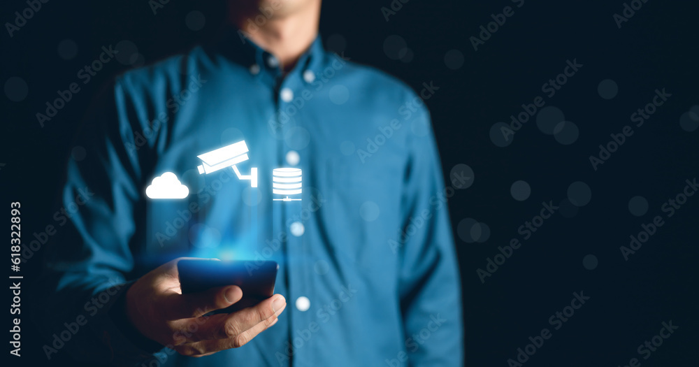 Poster man touching smartphonr for monitor cctv concept on a touch screen.