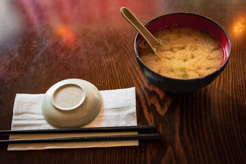 Miso soup in bowl in local Japanese restaurant in Vancouver BC.