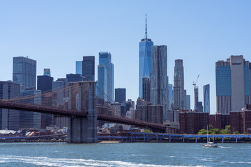Brooklyn bridge and New York City skyline from the water 