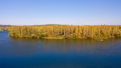 An aerial panoramic view on an autumn lake