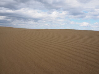 the Tottori Sand Dunes, wedged along the coast of Japan’s sparsely populated San’in region, the country’s very own slice of desert