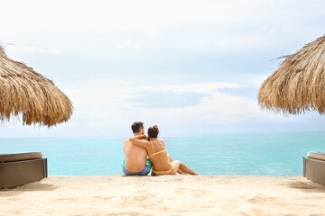 Couple on the beach enjoying the water