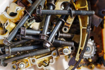 Auto mechanic repair engine in a car repair shop and Checking a car engine for repair at car garage.Car engine repair. Car service