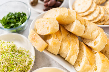 Butter board with vegetables and bread