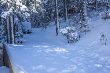 Snow covered mountains and homes during a storm