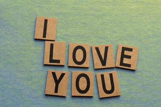 Sign formed with small pieces of wood with the text "I LOVE YOU".