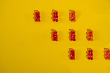 jelly bears candy isolated on a yellow background. Jelly Bean.