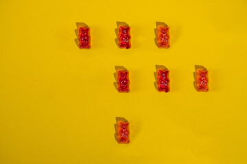 jelly bears candy isolated on a yellow background. Jelly Bean.
