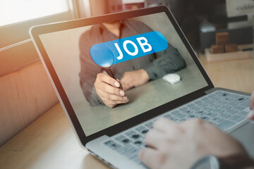 Jobless seeker looking for new vacancies on website page at laptop screen, recruitment concept. A...