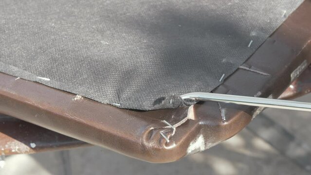 Removing staples from seat cushion Upholstery