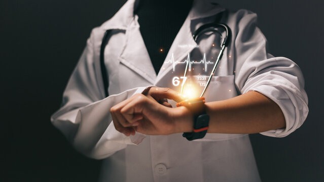 Close up image of female doctor with stethoscope holding light bulb
