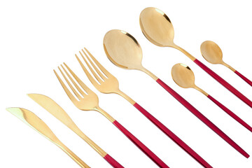 Golden set of cutlery with red handles on white background