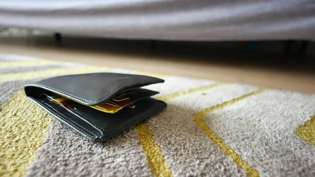  left wallet on floor at home 