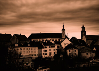 Fototapeta premium abstract european old town at sunset created with generative ai technology