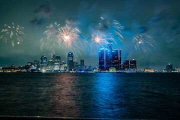 Detroit, Michigan Ford firewroks taken from Windsor, Ontario on the Detroit river with the downtown skyline visibile behind the fireworks