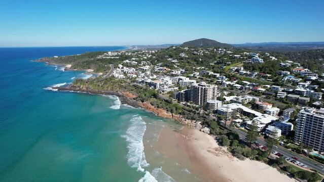 Stunning Coastline Of Coolum Beach During Summer In Queensland, Australia. aerial sideways