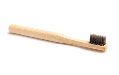 Bamboo tooth brush on white background