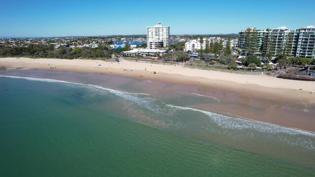 Panorama Of Mooloolaba Beach With Beachgoers In Summer. Sunshine Coast In Queensland, Australia. aerial pan right