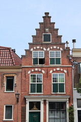 Fototapeta na wymiar Haarlem Bakenessergracht Canal House Facade with Stepped Gable Close Up, Netherlands