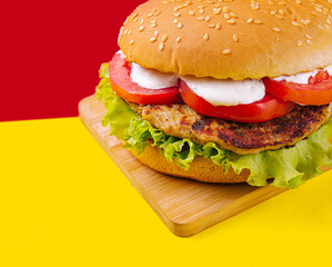 Burgers with cutlet, tomato and lettuce