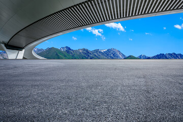 Asphalt road and bridge with mountain backgrounds