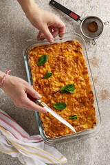 Close-up freshly baked homemade stuffed pie in a baking dish