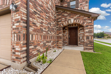 home entryway with brick 