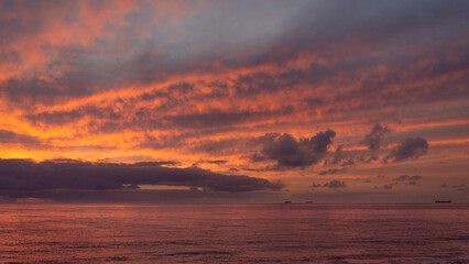 Naklejka na ściany i meble Colorful sunset above Indian Ocean