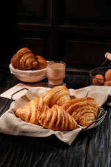 Freshly baked french croissant with dark mood theme