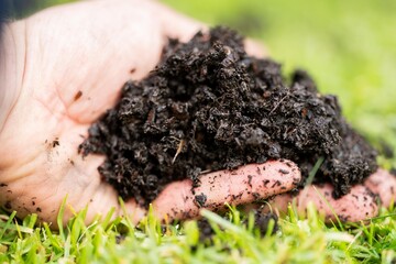 farmer holding soil in his hand on a farm in australia