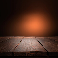 Wood table on dark blurred background. 
