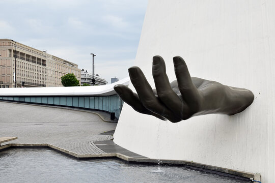 Le Havre, France - Le Volcan, Le Havre&rsquo;s famous landmark, designed by Brazilian architect Oscar Niemeyer and city center of Le Havre in background	