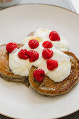 Pancakes with yogurt and raspberries