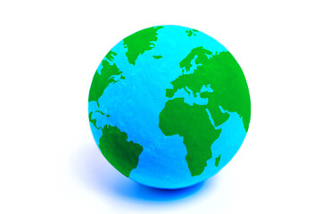Miniature Globe with Green Continents on White Background"