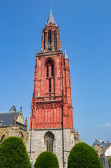 Fototapeta na wymiar Red tower of the St. Jan church in Maastricht, Netherlands