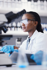 African scientist woman, laboratory and microscope analysis with thinking, pharmaceutical company...