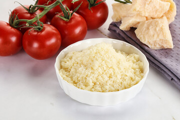 Shredded Italian hard parmesan cheese