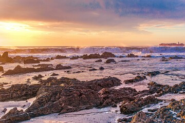 Beautiful sunset sky over the rocky Sea Point, Cape Town, South Africa