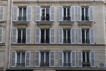 Fototapeta premium Paris building façades, characteristic roofs, and more.It gathers many types of buildings, coming from various districts of the city; all passing through various settings of the day.