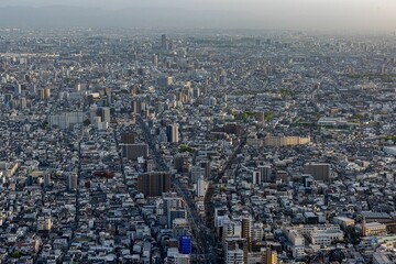 Aerial view of a bustling cityscape with tall skyscrapers in Tokyo, Japan