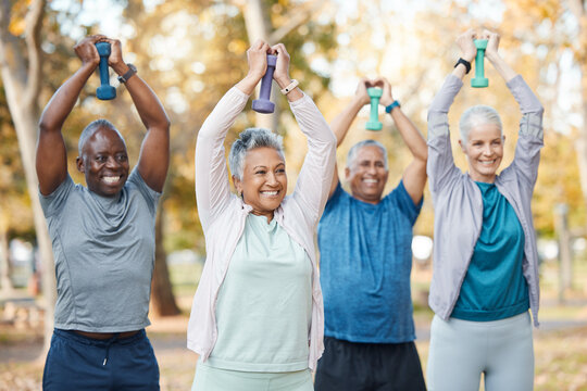 Fitness, weights and senior people in park for healthy body, wellness and active workout outdoors. Retirement, sports and men and women weightlifting for exercise, training and pilates for wellbeing