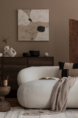 Aesthetic composition of warm living room interior with mock up poster frame, boucle sofa, wooden sideboard, round stool, patterned pillow, plaid and personal accessories. Home decor. Template.