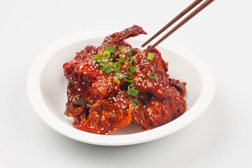 
A dish made by mixing trimmed crabs with a sauce made of red pepper powder, soy sauce, and sugar.