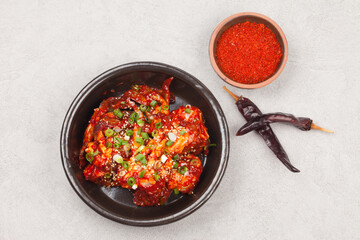 
A dish made by mixing trimmed crabs with a sauce made of red pepper powder, soy sauce, and sugar.